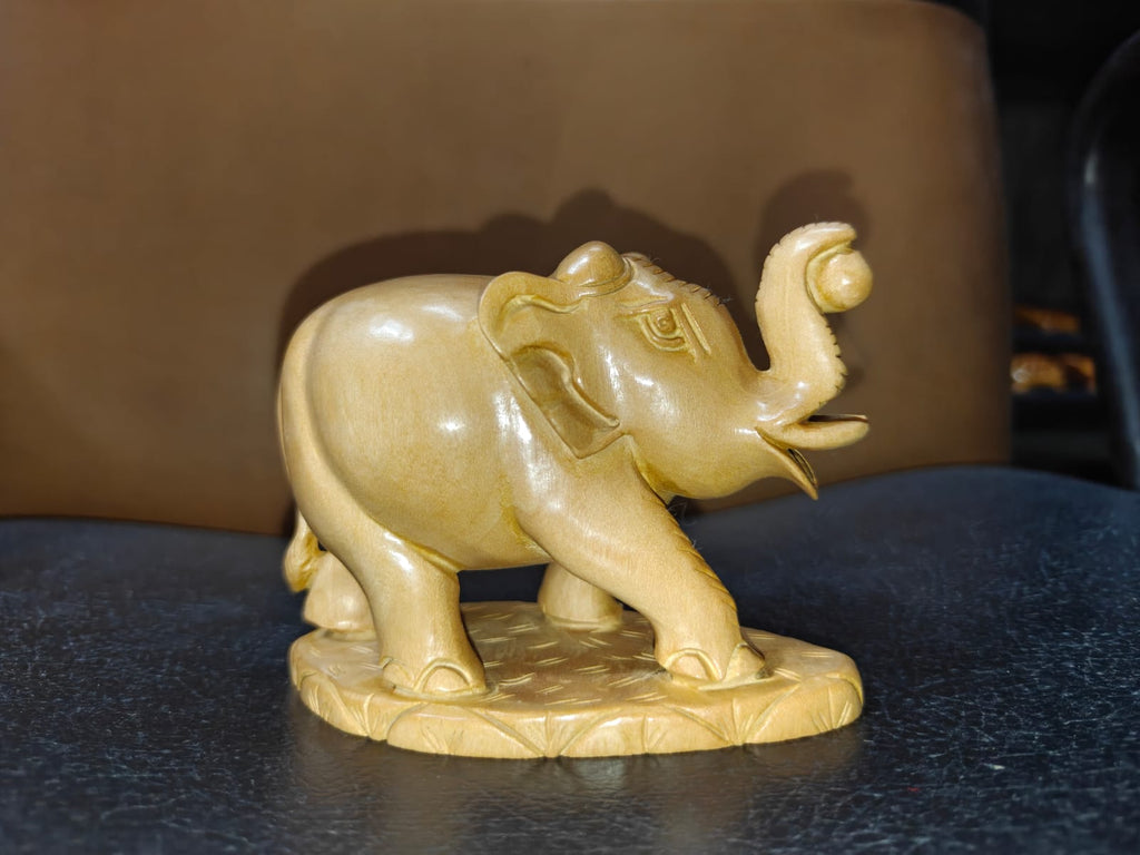 WOODEN TRUNK UP ELEPHANT WITH BALL