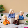 Set Of 4 Cute Little Monk Buddha Statues Decorative Showpieces For Car Dashboard, Home Office Decor