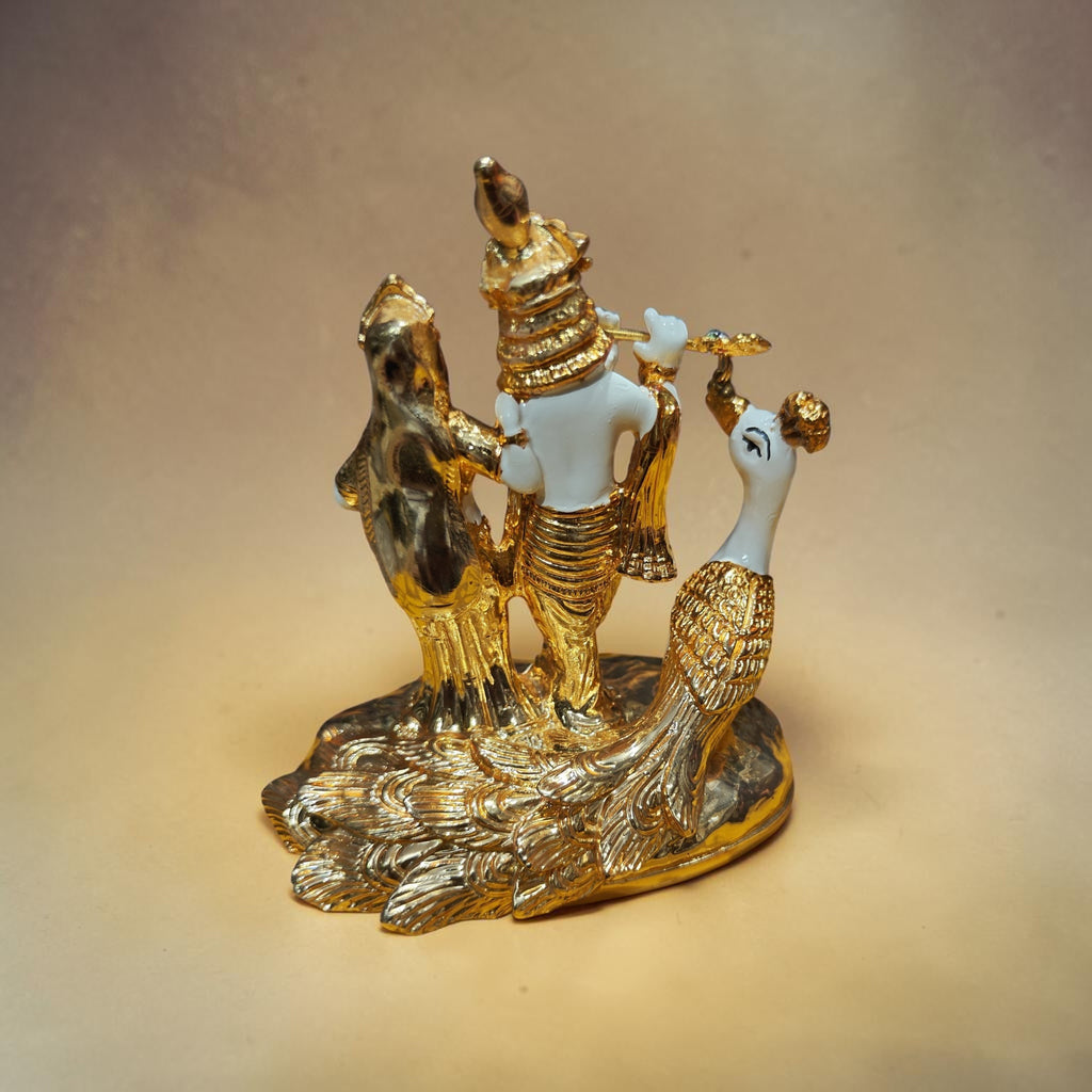 Radha Krishna with peacock gold plated statue
