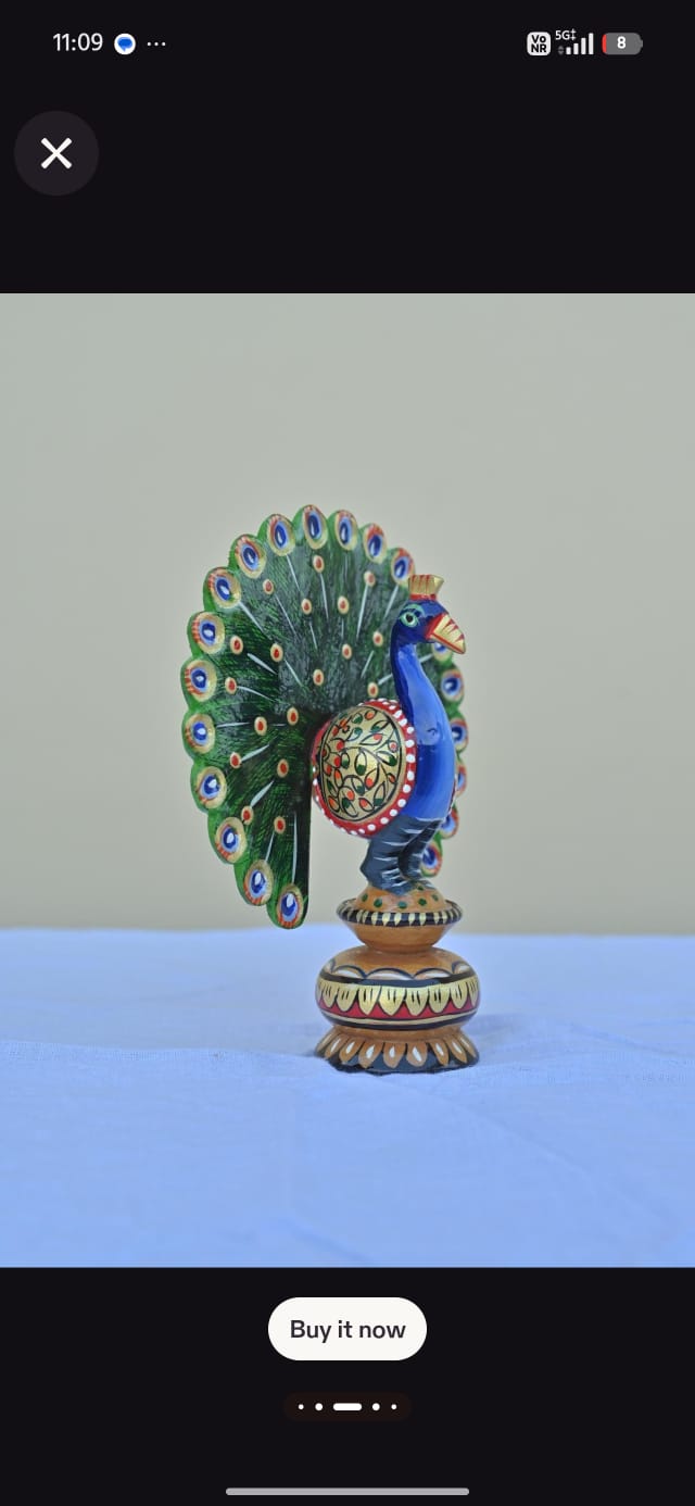 Wooden painting peacock
