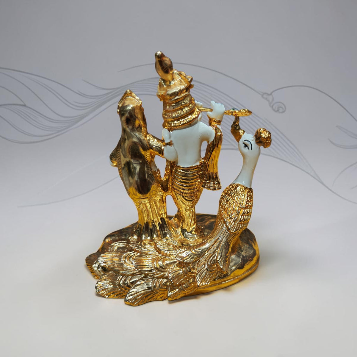 Radha Krishna with peacock gold plated statue