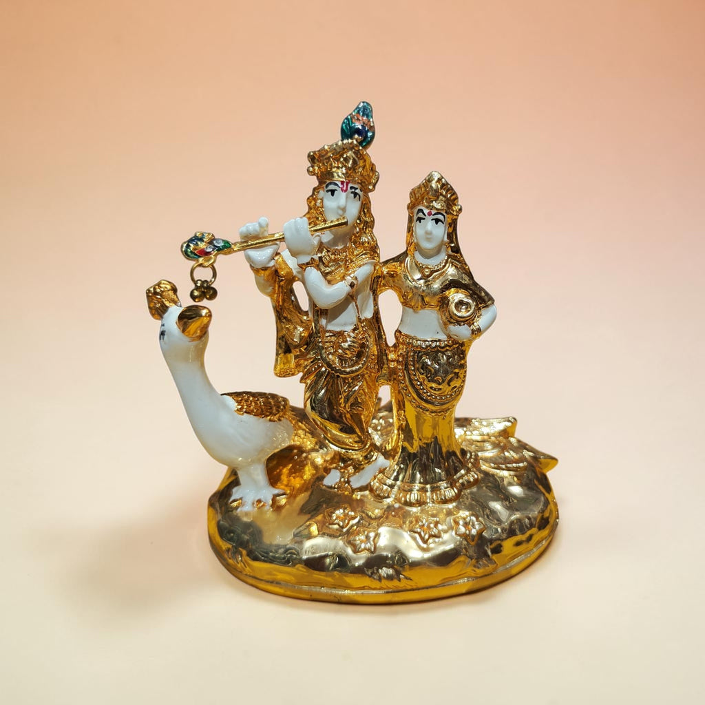 Radha Krishna with peacock gold plated statue