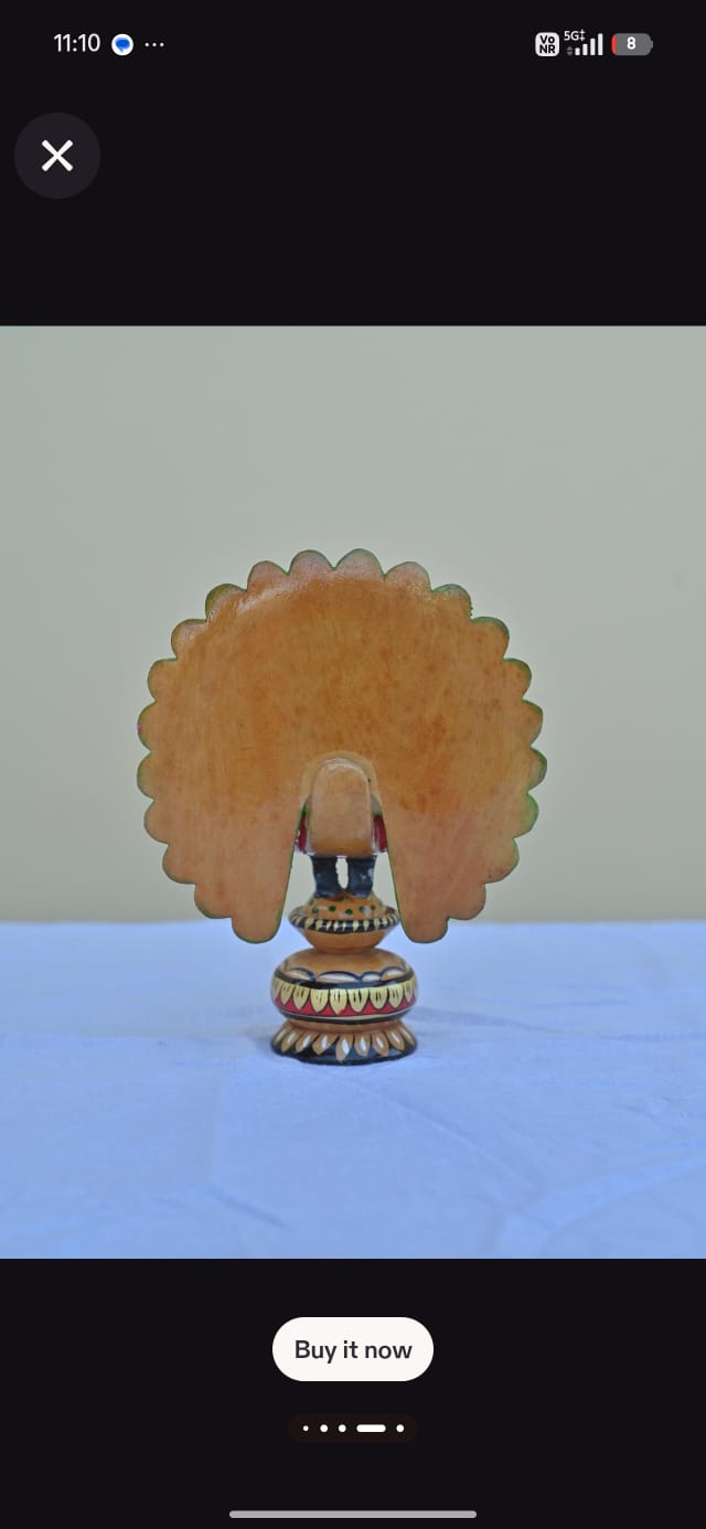 Wooden painting peacock