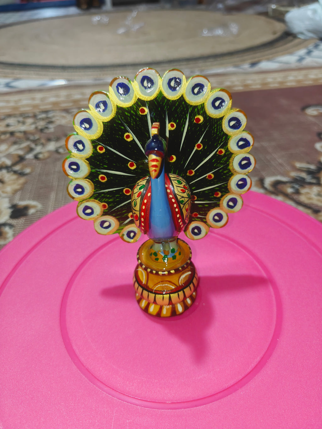 Wooden hand painted peacock