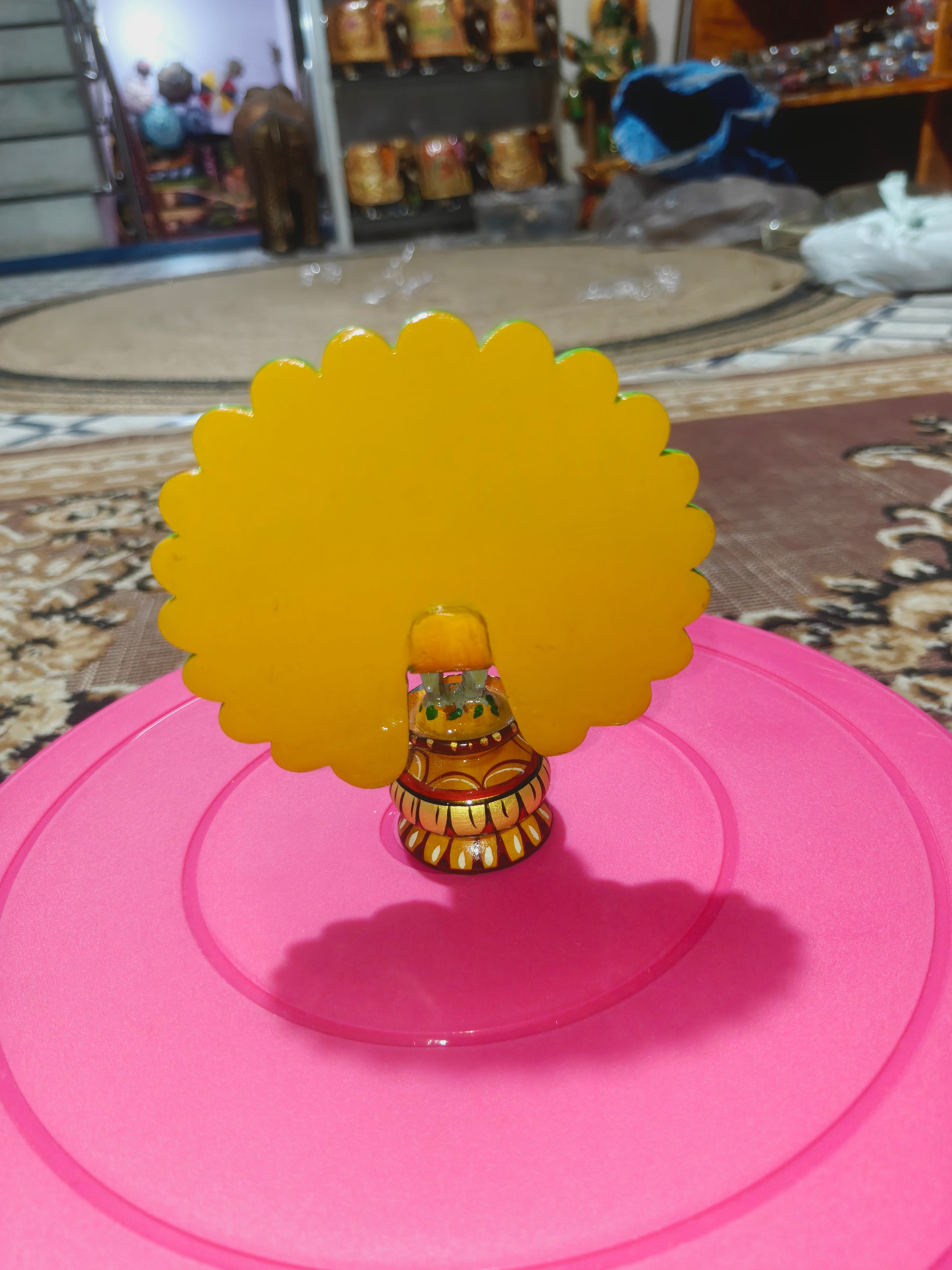 Wooden hand painted peacock