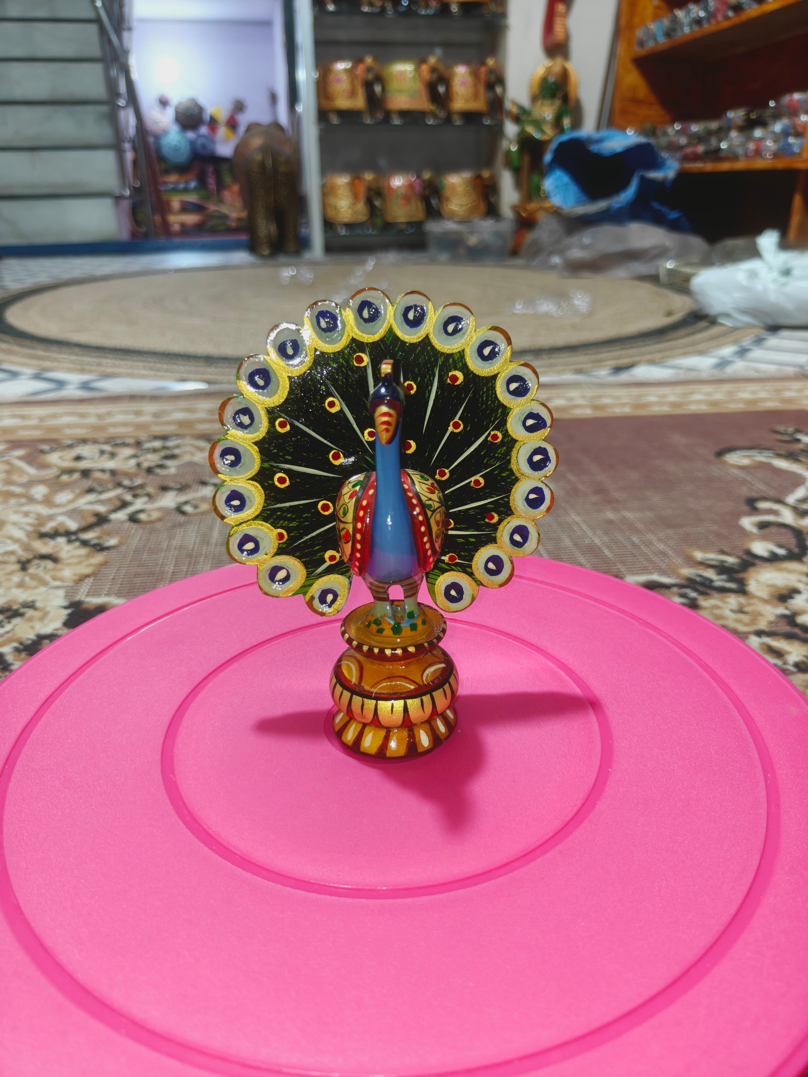 Wooden hand painted peacock