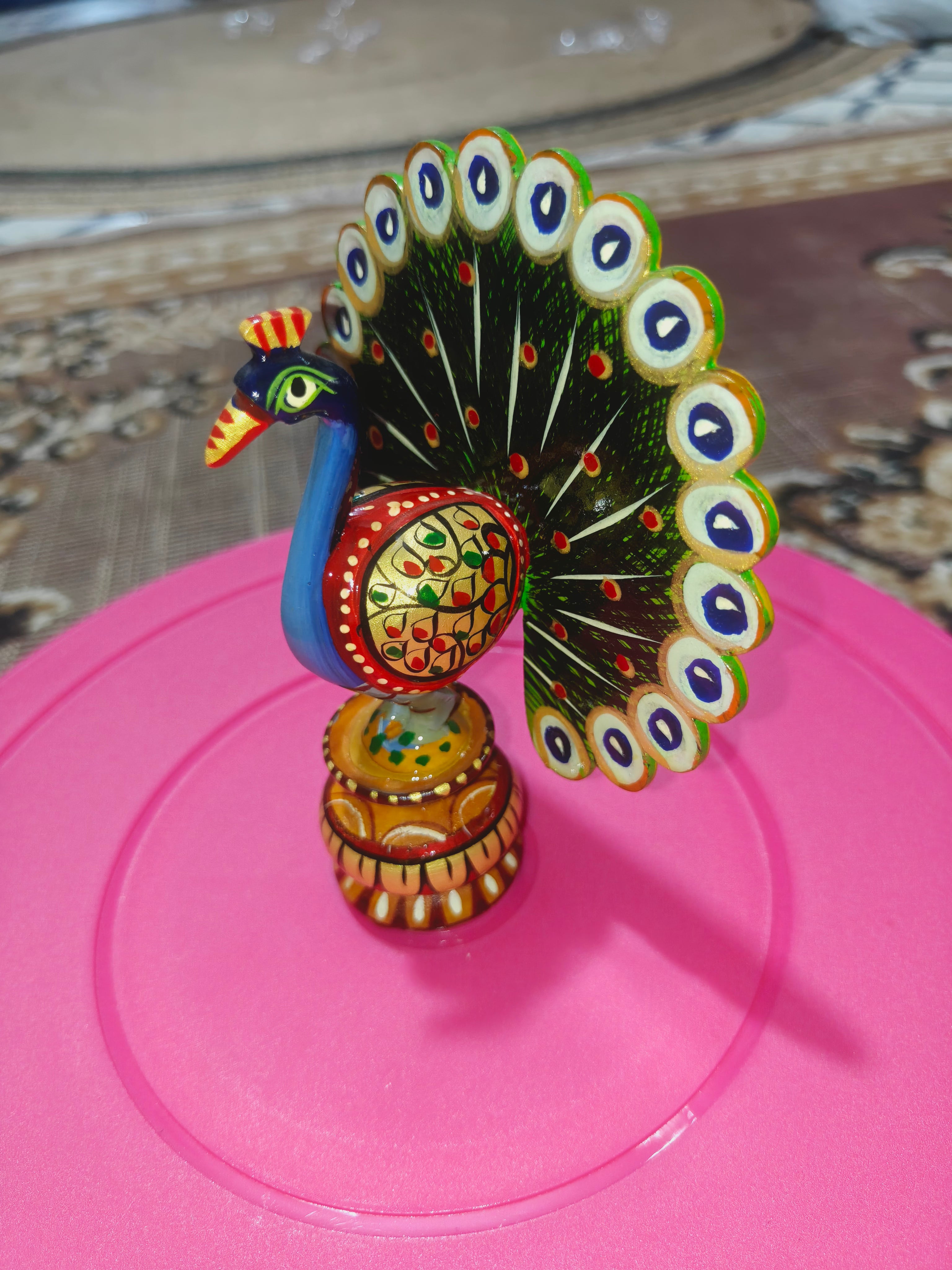 Wooden hand painted peacock