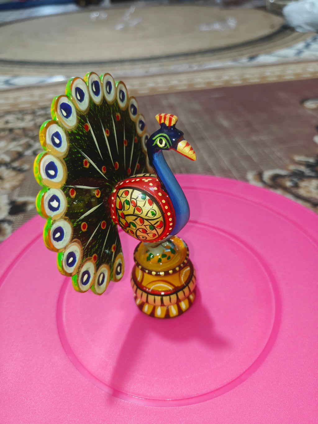 Wooden hand painted peacock