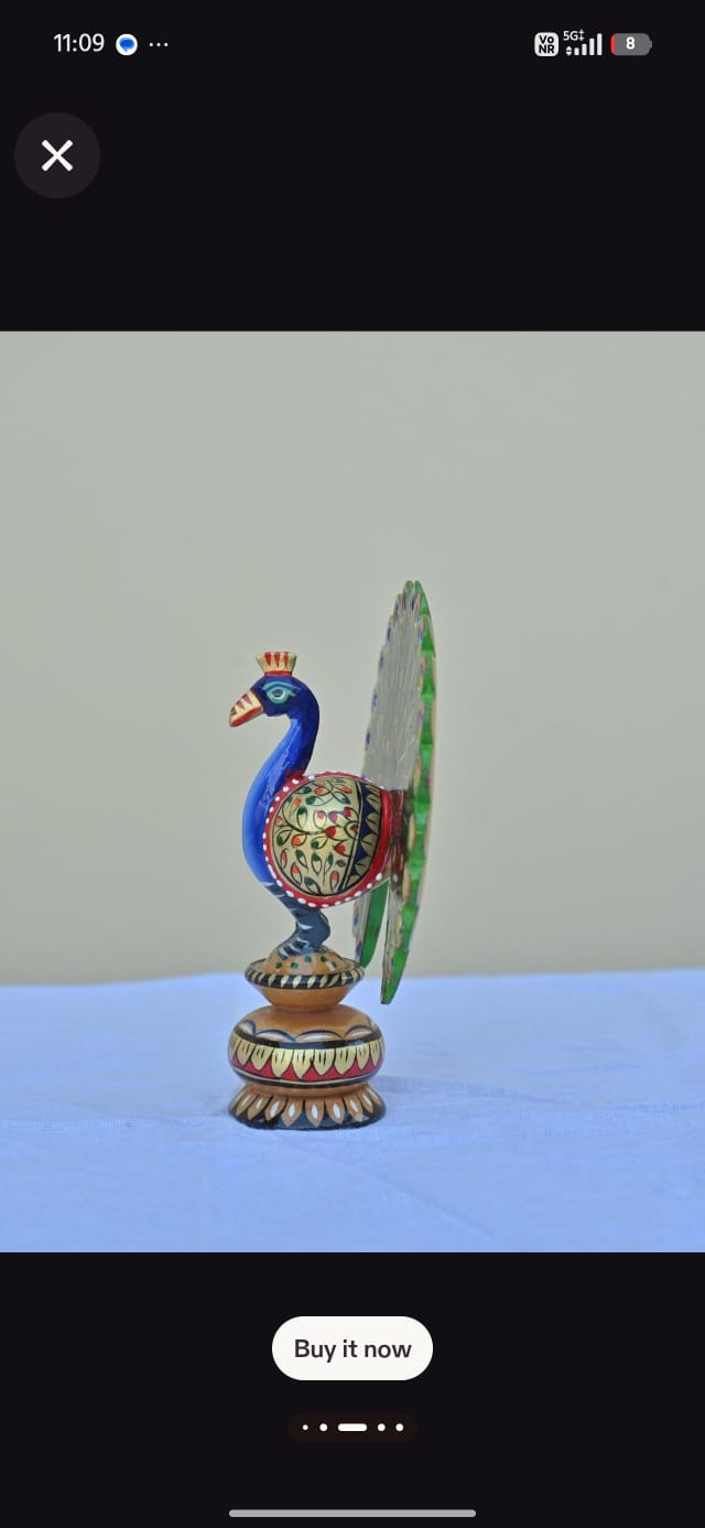 Wooden painting peacock