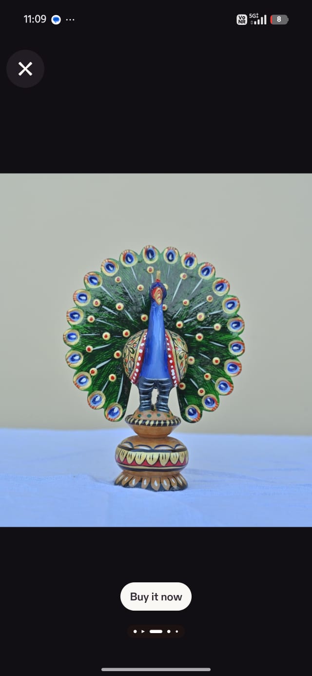Wooden painting peacock